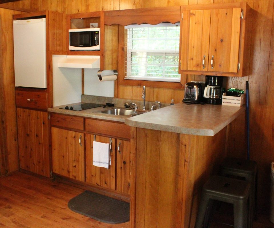 interior view of a cabin kitchen at Great Escapes RV Resorts Branson