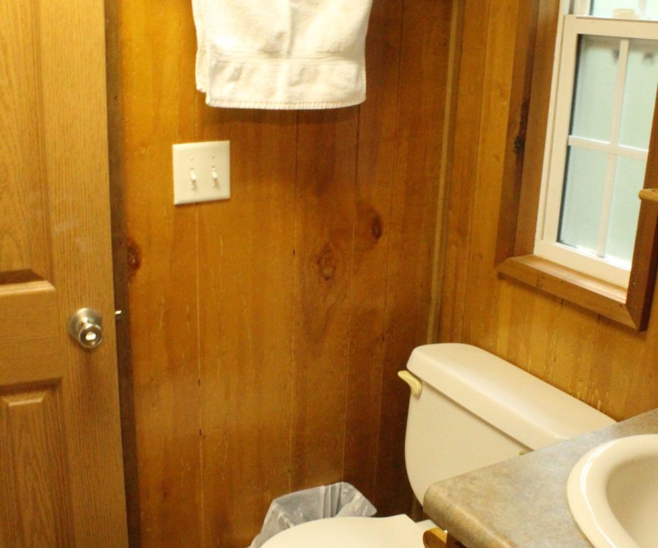 interior view of a cabin bathroom at Great Escapes RV Resorts Branson