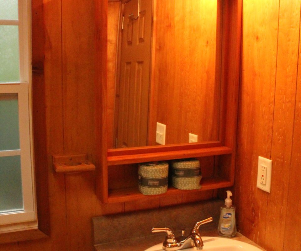 interior view of a cabin bathroom at Great Escapes RV Resorts Branson