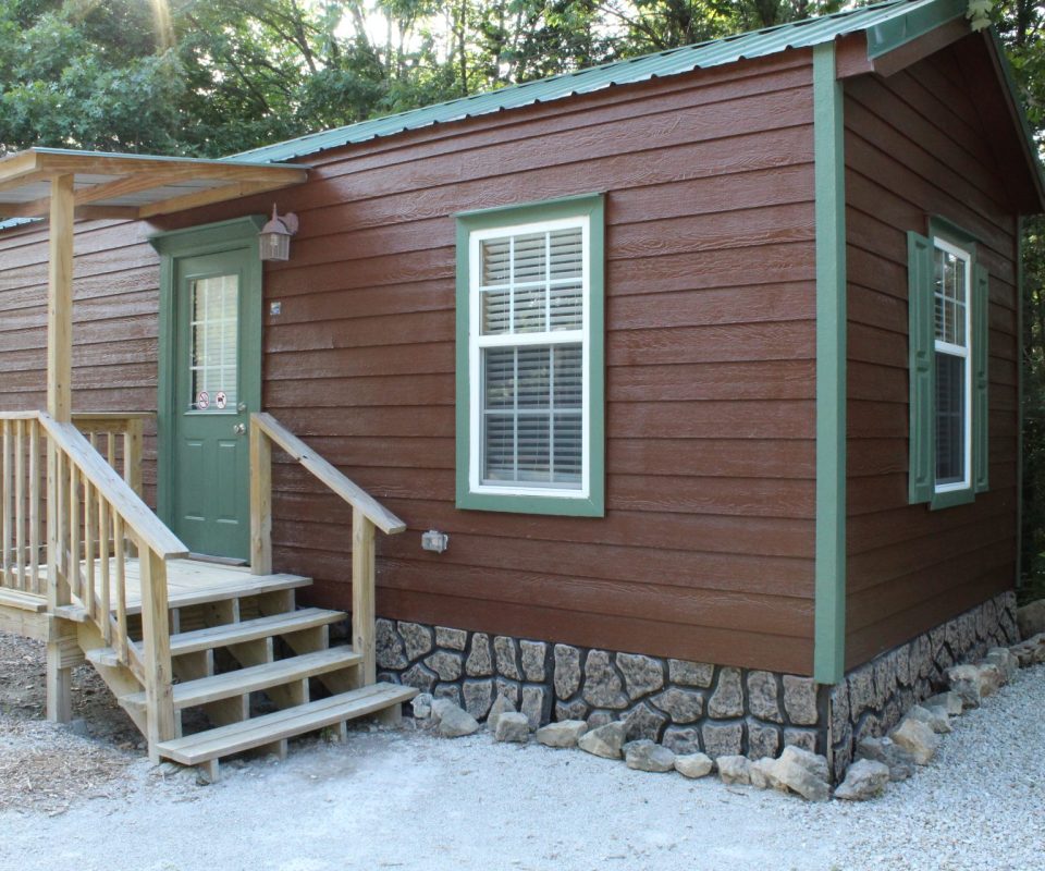 exterior view of a cabin door at Great Escapes RV Resorts Branson