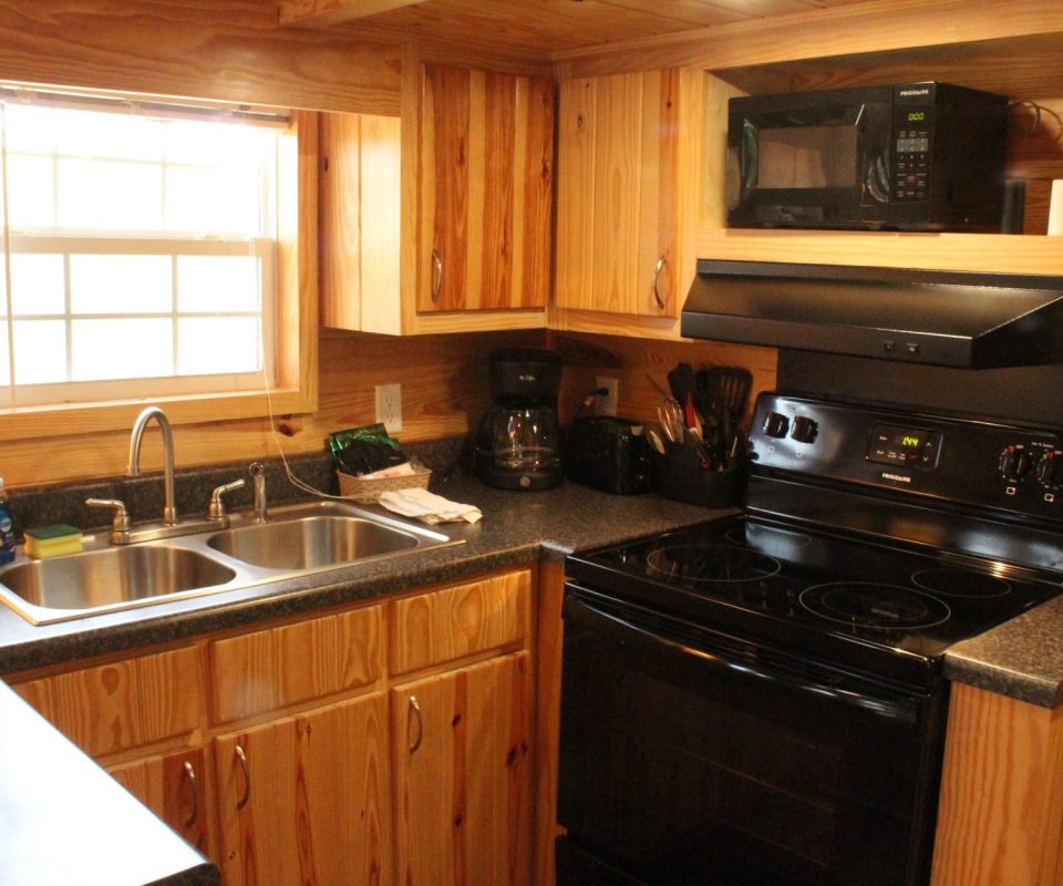 kitchen area of cabin at Great Escapes RV Resorts Branson