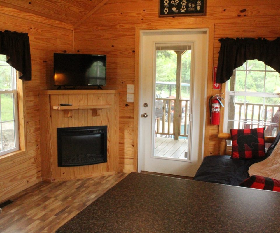 living room of cabin at Great Escapes RV Resorts Branson