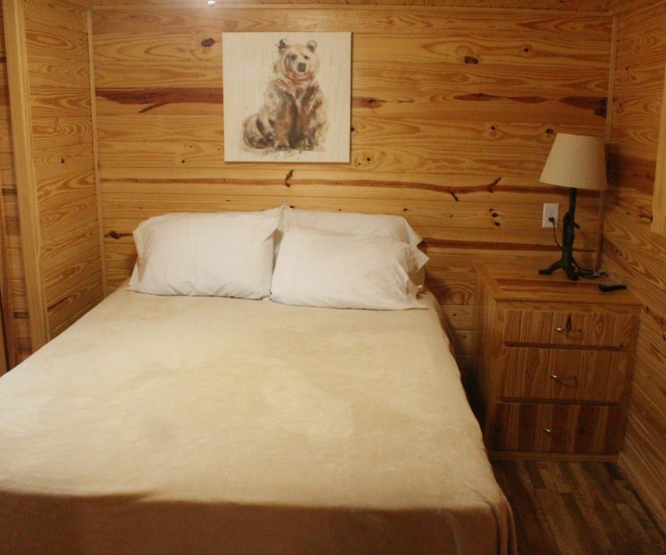 bedroom of cabin at Great Escapes RV Resorts Branson