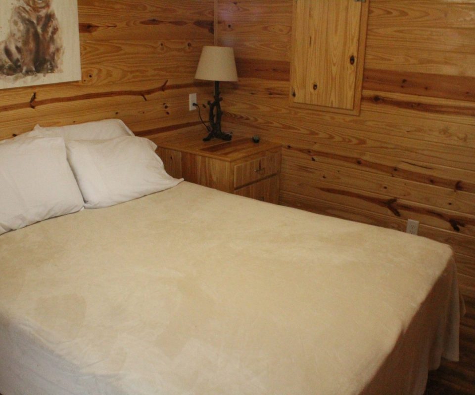 bedroom of cabin at Great Escapes RV Resorts Branson