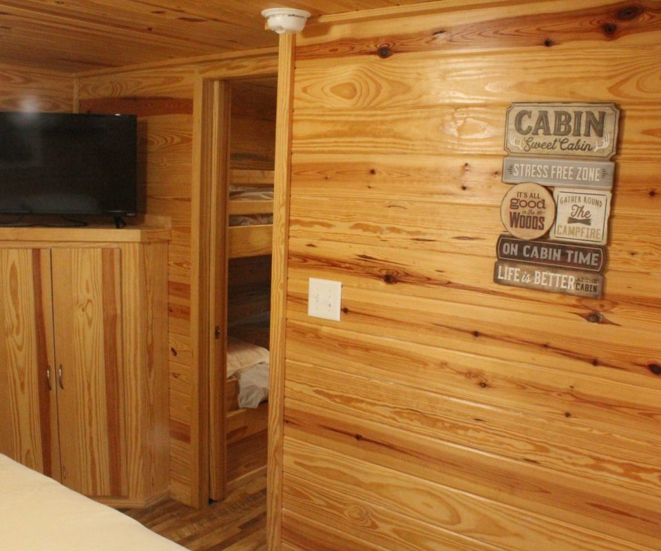 bedroom of cabin at Great Escapes RV Resorts Branson