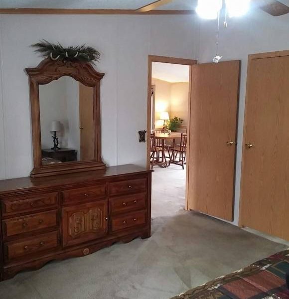 ozark house bedroom with drawers and mirror