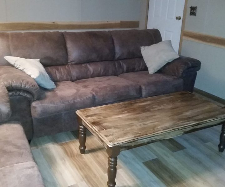 ozark house living room with couches and coffee table