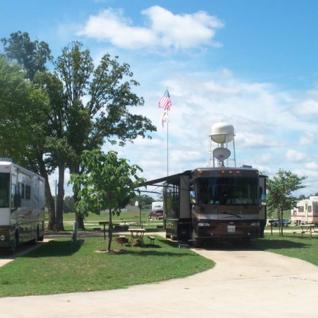 rv parked on concrete pad at Great Escapes RV Resorts Branson
