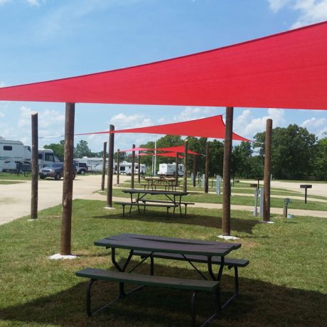 covered seating area at tent site